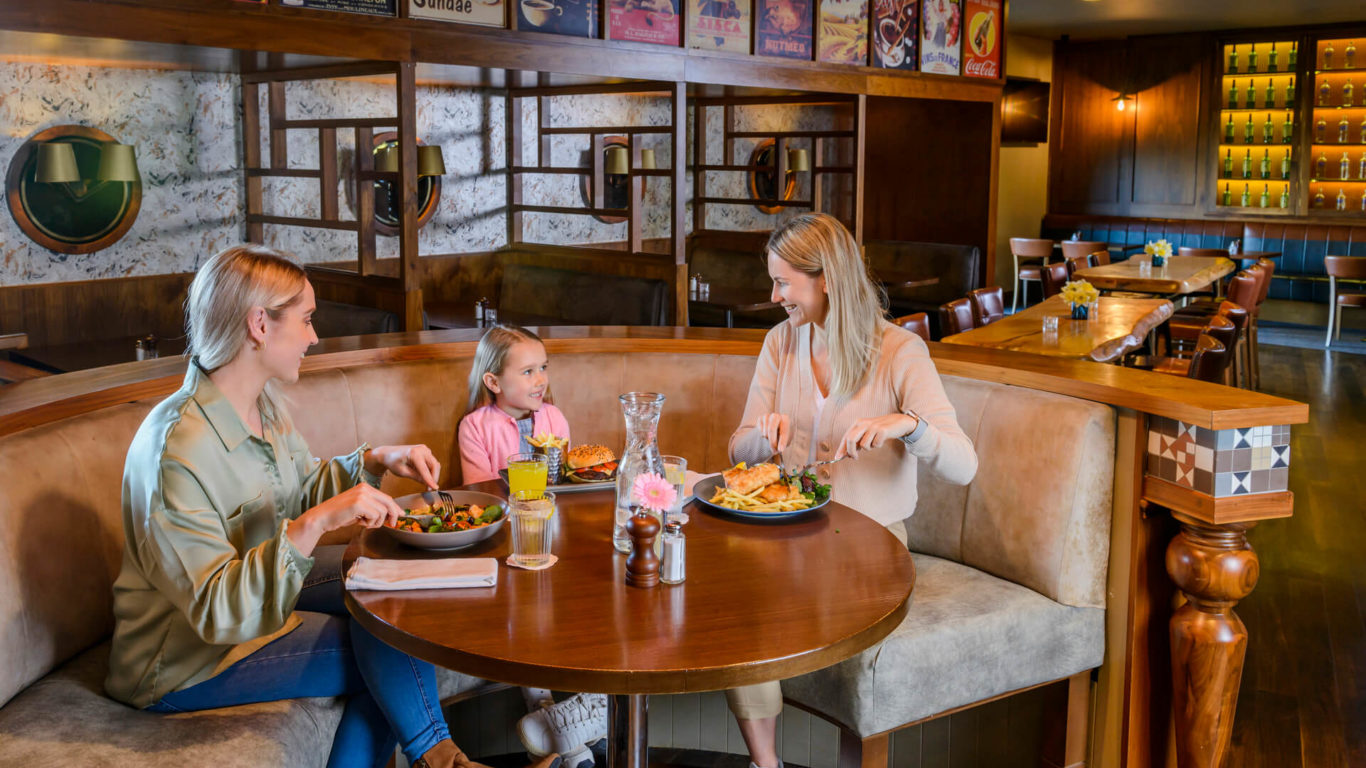 DINING_Bar _ Bistro _Manor-West-Bar-girls-dining-laughing